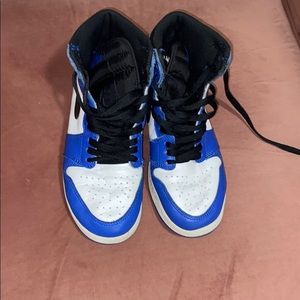 Royal Blue Jordan 1s in loved condition